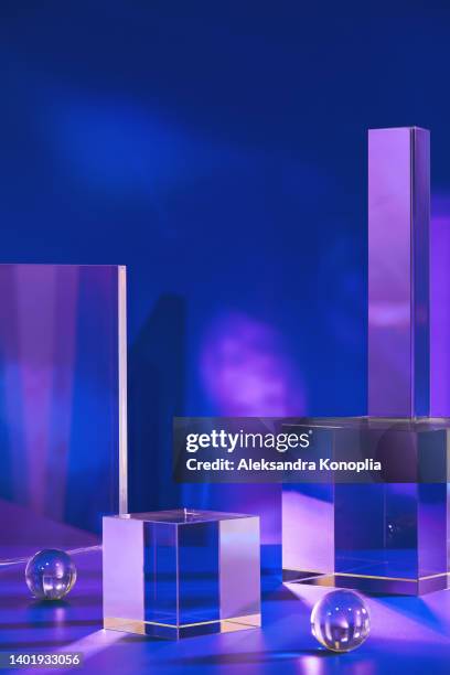 two abstract colorful empty crystal glass rectangle and cube pedestals - crystal cube stock pictures, royalty-free photos & images