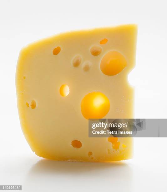 cheese on white background, studio shot - schweizer käse stock-fotos und bilder