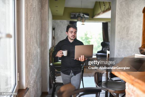 Man Carrying Laptop Photos and Premium High Res Pictures - Getty Images