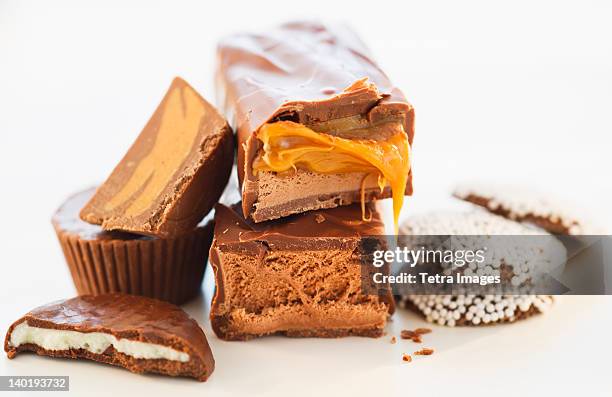 studio shot of chocolate bars - caramel stock pictures, royalty-free photos & images
