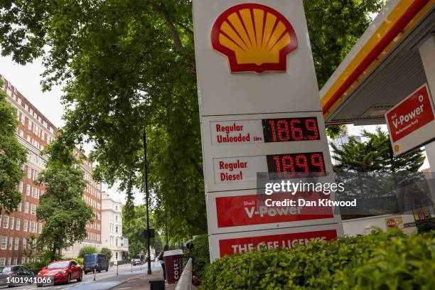 Prices are displayed on a petrol station forecourt on June 09, 2022 in London, England. UK Fuel prices rose again today bringing the cost of filling...