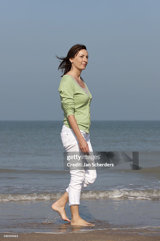 The Netherlands, Domburg, Woman on beach