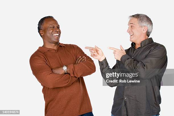 studio shot of two mature men - friends studio shot stock pictures, royalty-free photos & images