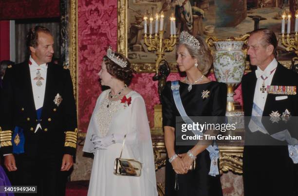 Queen Elizabeth stands with King Juan Carlos , Queen Sofia and Prince Philip at a State Banquet held at El Pardo Palace in Madrid, Spain, 17th...