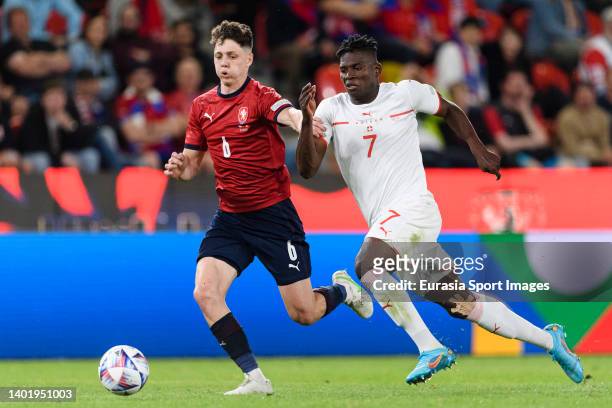 Breel Embolo of Switzerland fights for the ball with Ladislav Krejci of Czech Republic during the UEFA Nations League League A Group 2 match between...