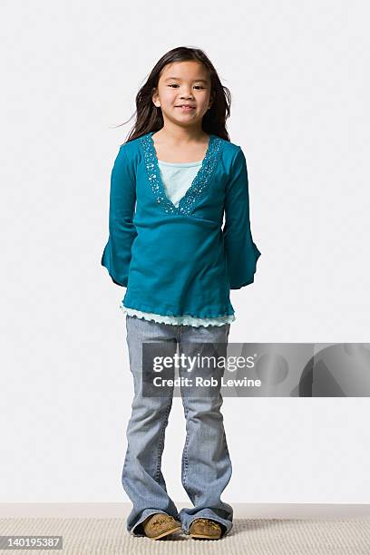 studio portrait of smiling girl (8-9) - young girl white background stock pictures, royalty-free photos & images