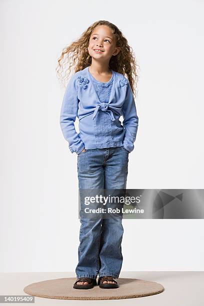 studio portrait of smiling girl (8-9) - portrait white background looking away stock pictures, royalty-free photos & images