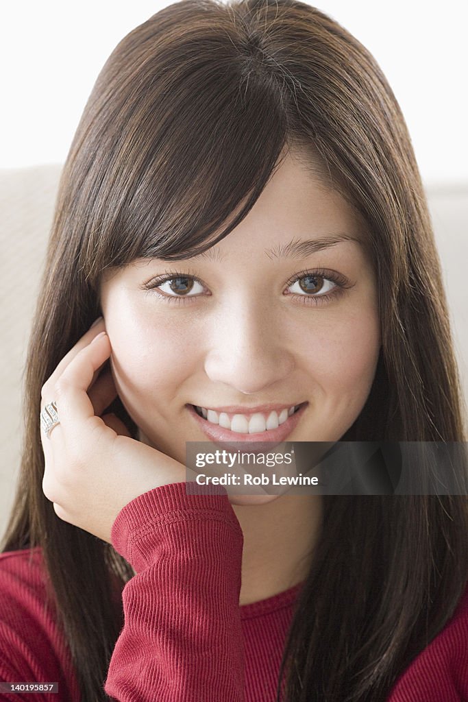 USA, California, Los Angeles, Portrait of young woman smiling