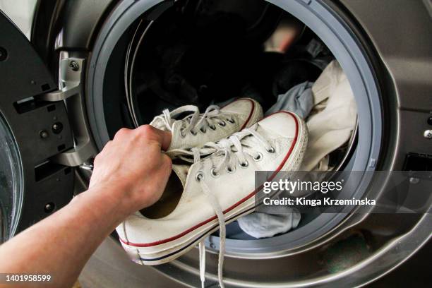 washing sneakers - white laundry foto e immagini stock