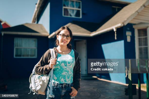 teenager student girl in front of her home - chilean ethnicity stock pictures, royalty-free photos & images