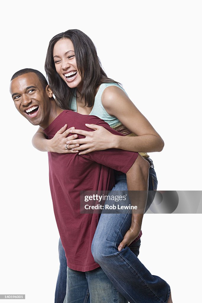 Portrait of young couple enjoying together