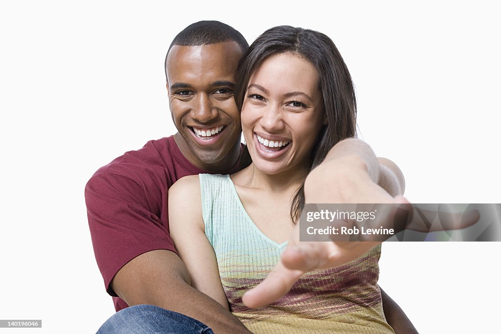 Studio portrait of young couple