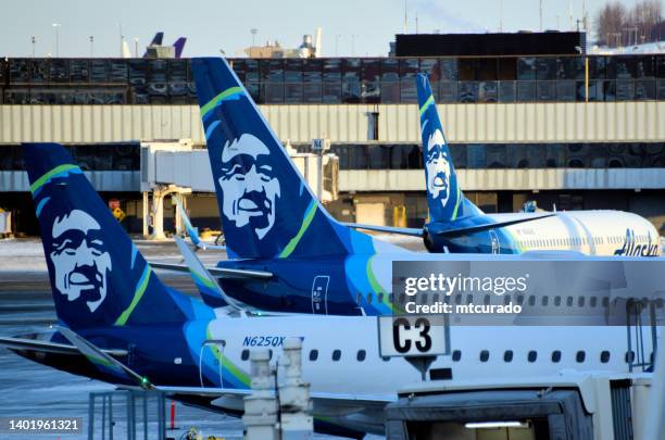 alaska airlines boeing 737s, ted stevens anchorage international airport, south terminal, anchorage, alaska, usa - anchorage airport stock pictures, royalty-free photos & images