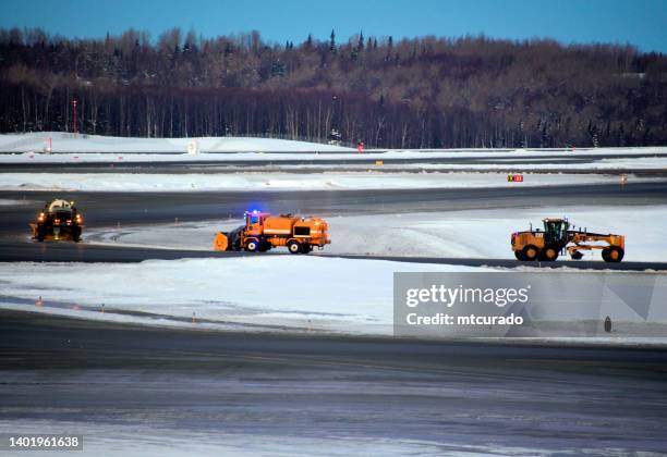 snowplowing an airport runway and taxiways, ted stevens anchorage international airport, anchorage, alaska, usa - anchorage airport stock pictures, royalty-free photos & images