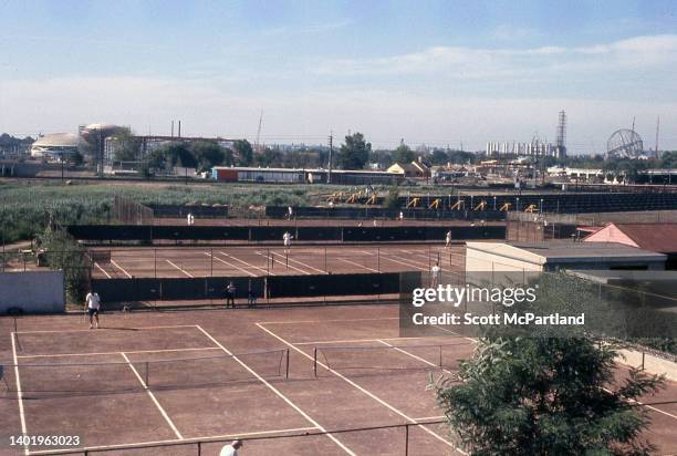 Elevated view of the tennis courts at Flushing Meadows Park in Corona, Queens, New York, New York, July 1963. Visible in the background is the...