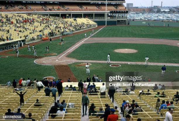 View of spectators in the stands of opening day at Shea Stadium, in the Corona neighborhood of Queens, New York, New York, April 17, 1964. The day...