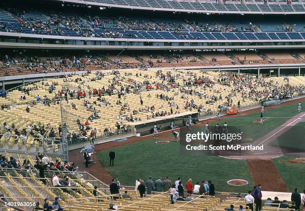 View of spectators in the stands of opening day at Shea Stadium, in the Corona neighborhood of Queens, New York, New York, April 17, 1964. The day...