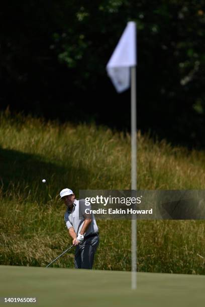 Erik Compton plays his second shot of the 17th hole during the first round of the BMW Charity Pro-Am at Thornblade Club on June 09, 2022 in Greer,...