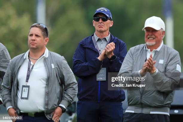 Ex Premier League referee, Mike Dean who is caddying for Felicity Johnson of England looks on from the 18th green during Day One of the Volvo Car...