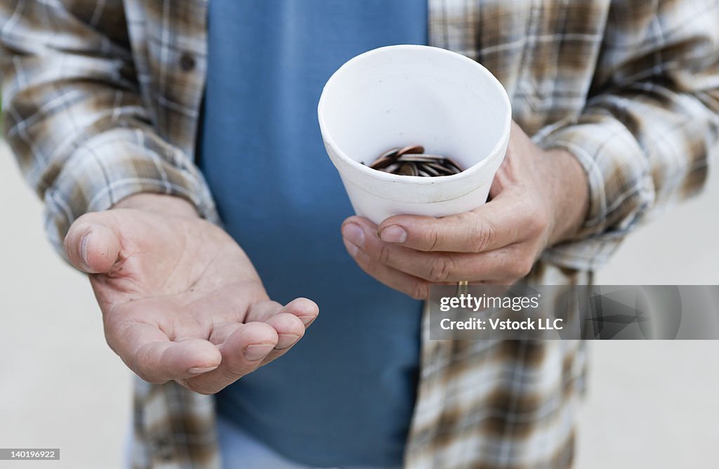 USA, Illinois, Metamora, Close-up of man begging for money