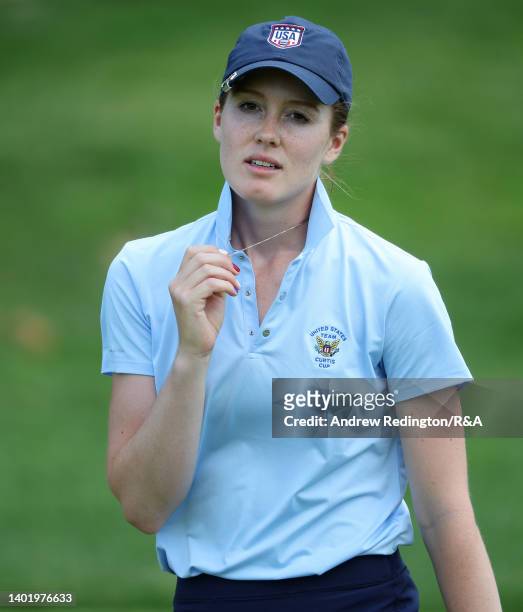 Emilia Migliaccio of Team USA touches her necklace during a practice round ahead of The Curtis Cup at Merion Golf Club on June 09, 2022 in Ardmore,...