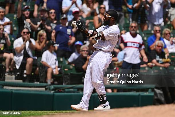 Josh Harrison of the Chicago White Sox reacts after his triple in the third inning against the Los Angeles Dodgers at Guaranteed Rate Field on June...