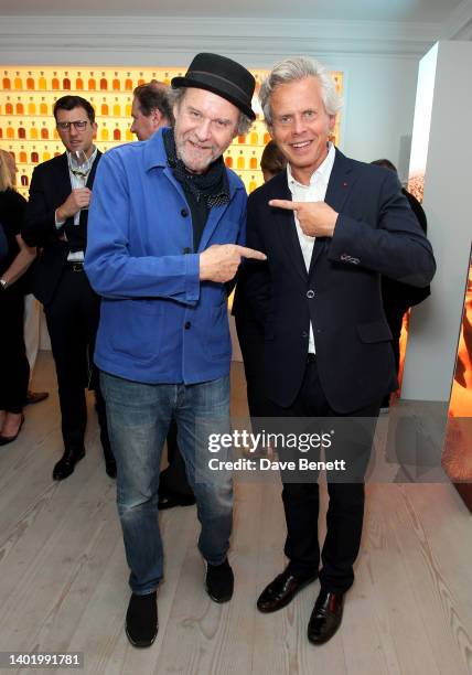 Mike Figgis and host Hennessy President and CEO Laurent Boillot, during an exclusive event in celebration of the launch of Maison Hennessy's...