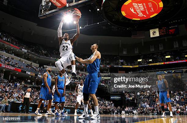 Rudy Gay of the Memphis Grizzlies dunks of Yi Jianlian of the Dallas Mavericks on February 29, 2012 at FedExForum in Memphis, Tennessee. NOTE TO...