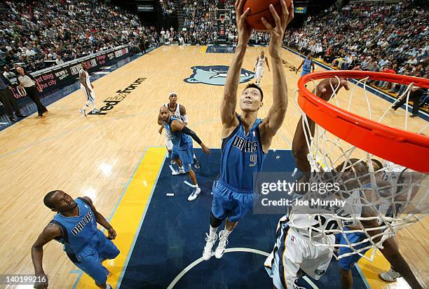 Yi Jianlian of the Dallas Mavericks rebound against the Memphis Grizzlies on February 29, 2012 at FedExForum in Memphis, Tennessee. NOTE TO USER:...
