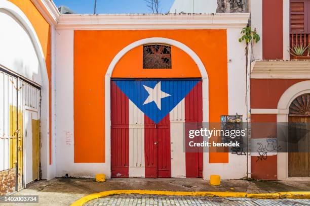 san juan puerto rico gate puerto rican flag - viejo san juan stock pictures, royalty-free photos & images