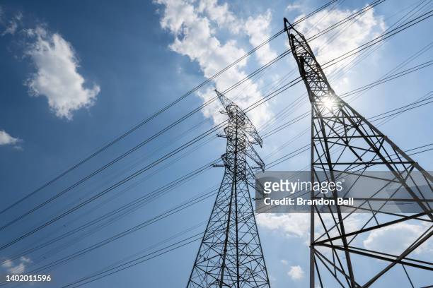 Transmission towers are seen at the CenterPoint Energy powerplant on June 09, 2022 in Houston, Texas. Power demand in Texas is expected to set new...