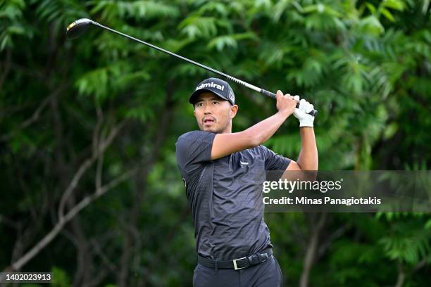 Satoshi Kodaira of Japan plays his shot from the fifth tee during the first round of the RBC Canadian Open at St. George's Golf and Country Club on...