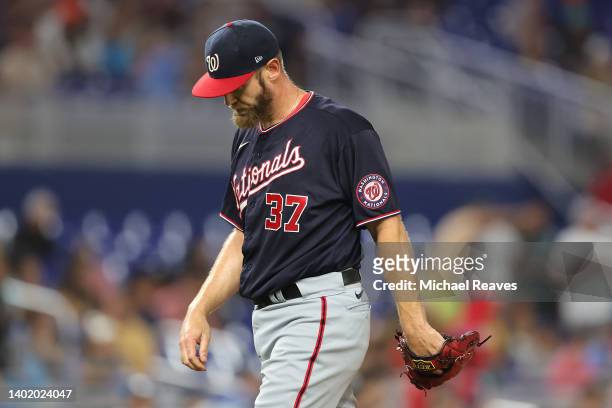 Stephen Strasburg of the Washington Nationals reacts as he is taken out of the game by manager Dave Martinez during the fifth inning against the...