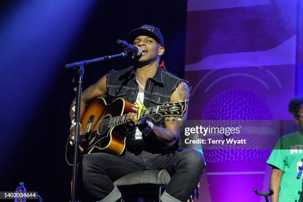 Singer Jimmie Allen performs during CMA Fest 2022 at CMA Close Up Stage in Music City Center on June 09, 2022 in Nashville, Tennessee.
