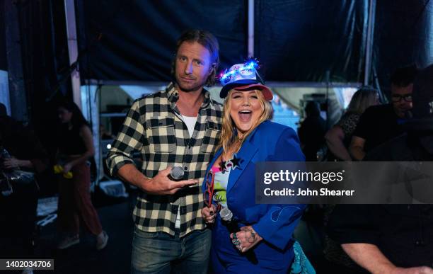 Dierks Bentley and Elle King attend day 1 of the 49th CMA Fest at Nissan Stadium on June 09, 2022 in Nashville, Tennessee.