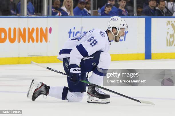 Mikhail Sergachev of the Tampa Bay Lightning celebrates after shooting the go-ahead goal against the New York Rangers during the third period in Game...