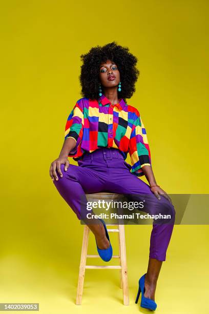 fashionable woman in colorful shirt - multi coloured shirt stock pictures, royalty-free photos & images