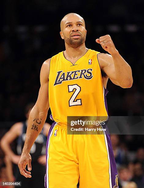 Derek Fisher of the Los Angeles Lakers celebrates a score against the Minnesota Timberwolves during a 105-84 win at Staples Center on February 29,...