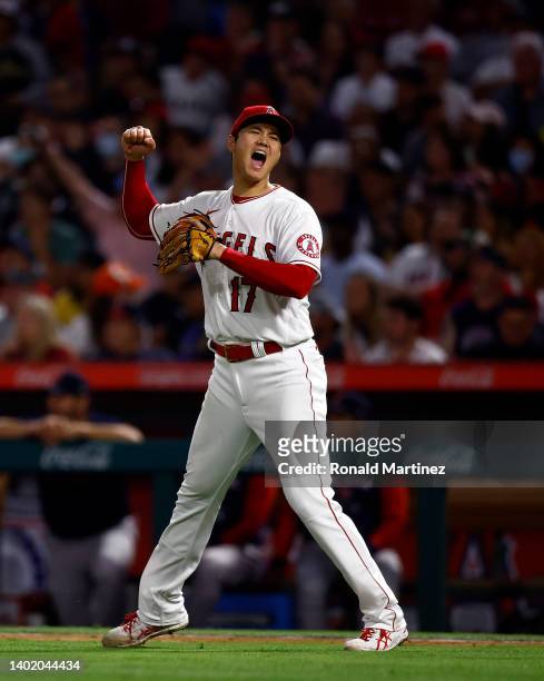 Shohei Ohtani of the Los Angeles Angels celebrates the third out in the sixth inning against the Boston Red Sox at Angel Stadium of Anaheim on June...