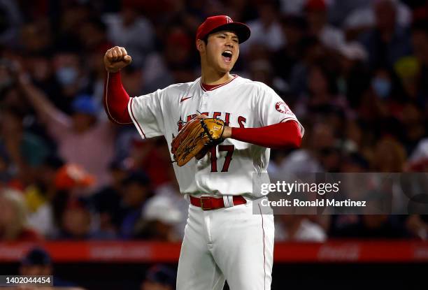 Shohei Ohtani of the Los Angeles Angels celebrates the third out in the sixth inning against the Boston Red Sox at Angel Stadium of Anaheim on June...