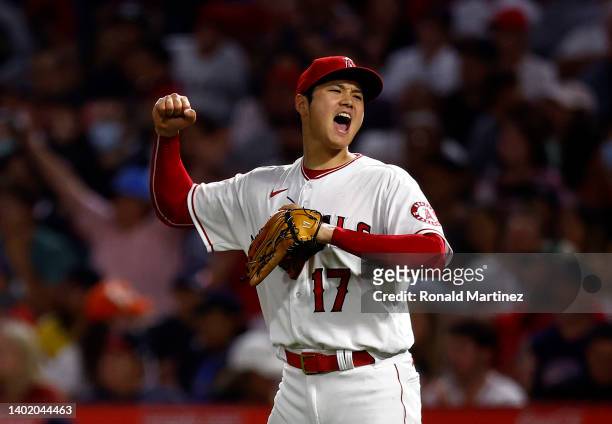 Shohei Ohtani of the Los Angeles Angels celebrates the third out in the sixth inning against the Boston Red Sox at Angel Stadium of Anaheim on June...