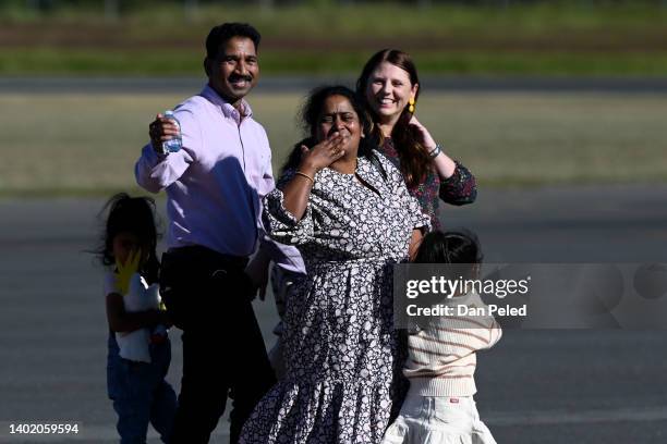 Priya and Nades Murugappan and their daughters Kopika and Tharnicaa arrive at the Thangool Aerodrome on June 10, 2022 near Biloela, Australia. Four...