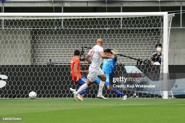 Issam Jebali of Tunisia scores his side's second goal during the international friendly match between Chile and Tunisia at Noevir Stadium Kobe on...