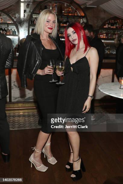 Kelly McWilliams and Ava Max attend ELLE Women in Music Celebrates Doja Cat presented by Dolce & Gabbana at Olivetta on June 09, 2022 in West...