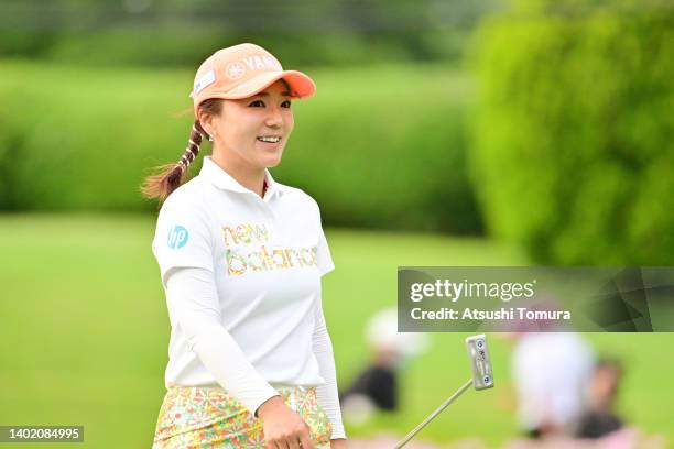 Chie Arimura of Japan smiles on the 18th green during the second round of Ai Miyazato Suntory Ladies Open at Rokko Kokusai Country Club on June 10,...