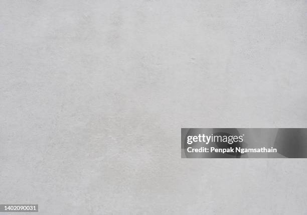 white smooth surface bright soft blue cement wall background material texture mock up for design arts as presentation, simple banner ads wallpaper concept stock photo - parete di cemento foto e immagini stock