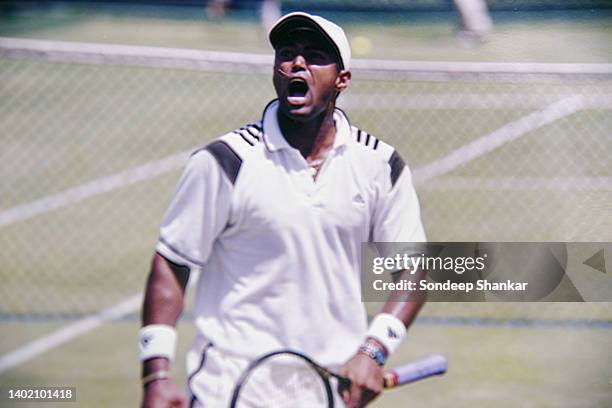 Leander Paes of India reacts in a geme against Yongil Yoon of South Korea in the first singles of the Davis Cup Asia round match in New Delhi, April...