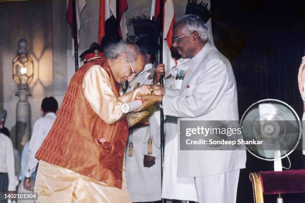 President K R Narayanan presenting Padma Vibhushan award to leading Indian classical style singer Pandit Jasraj at Presidential Palace in New Delhi....