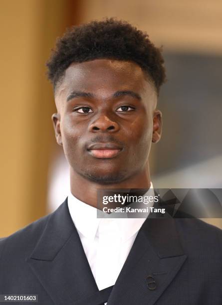 Bukayo Saka attends a reception to celebrate the Commonwealth Diaspora hosted by Prince Charles, Prince of Wales and Camilla, Duchess of Cornwall at...