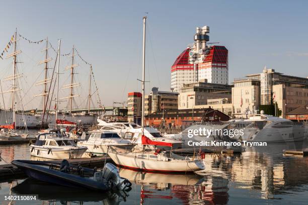 a marina in a city environment - gothenburg stock-fotos und bilder